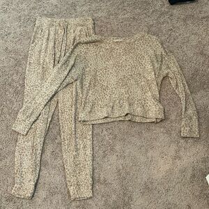 This is a tan chetah print long sleeve and pants pajama set.
